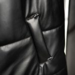 تصویر شاخص وست چرم مشکی برند DOW با نورپردازی حرفه‌ای، نمایش کامل طراحی محصول و تولید شده در پروژه عکاسی صنعتی کاز نوین شمال.